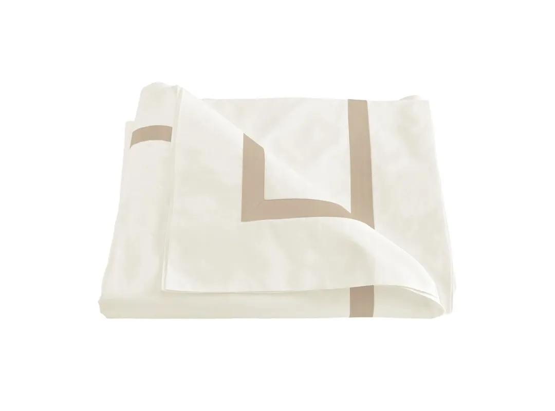 Lowell Champagne on Ivory Bedding